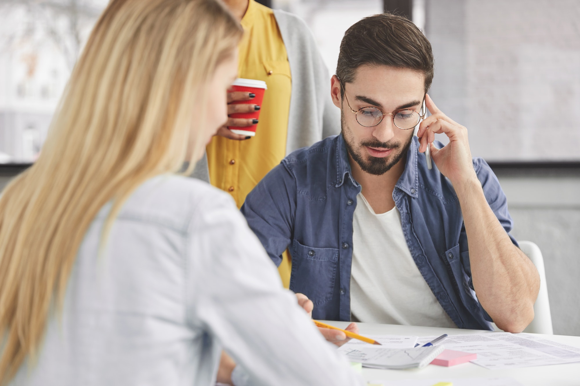 female-and-male-marketing-experts-meet-together-and-collaborate-creat-advertising-campaign-sit-in